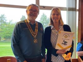2024 16th May - President Ken inducting Hilary Whitty as a new member of the club.